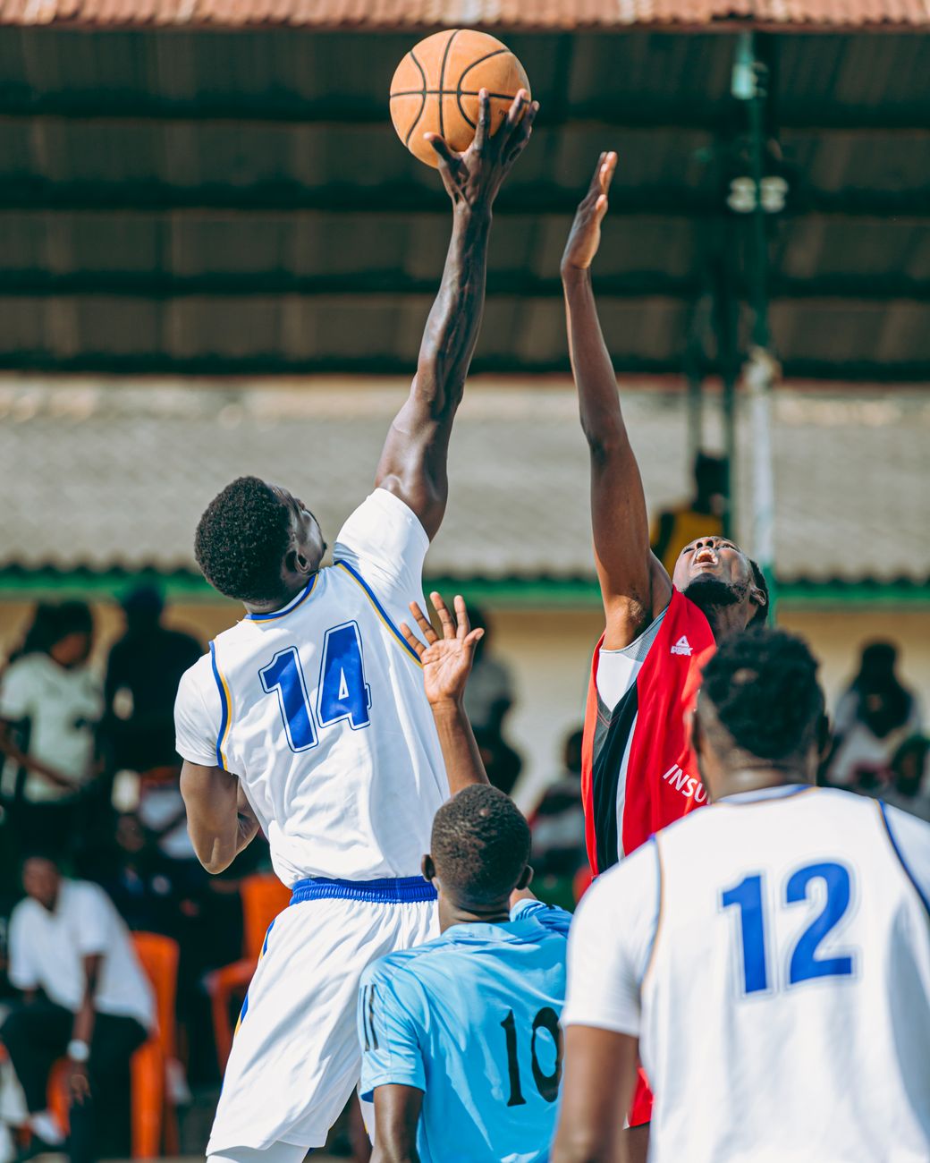 competitive basketball game jump shot action