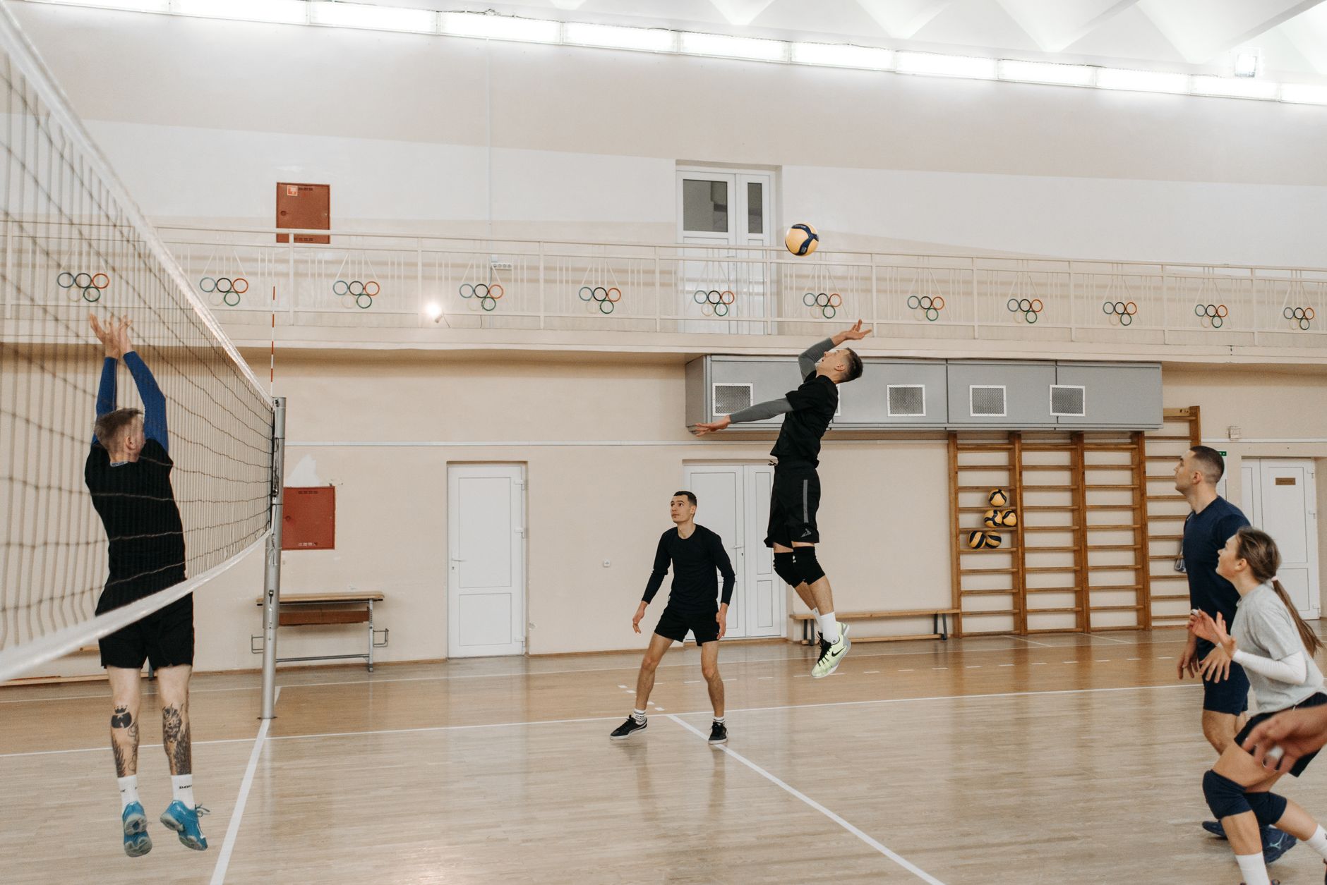 people playing volleyball game